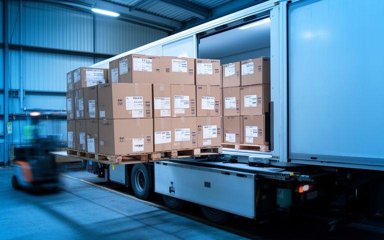 Pharmaceutical cargo being loaded into a chilled reefer trailer